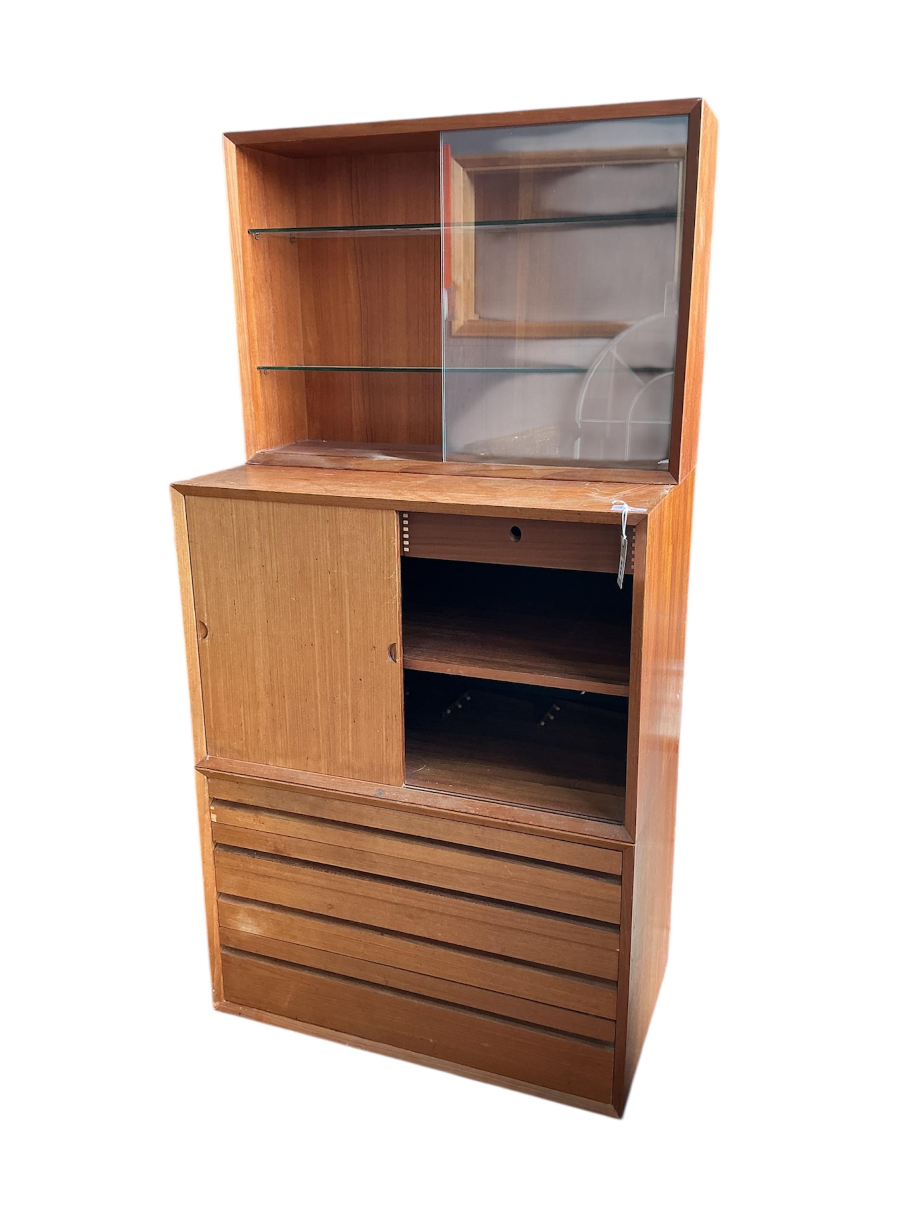 A Poul Cadovius Royal System teak three section wall system, width 80cm, depth 46cm, height 159cm